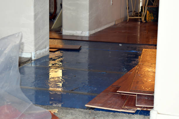 Professional Flood Damage Restoration technician working in Daytona Beach, FL